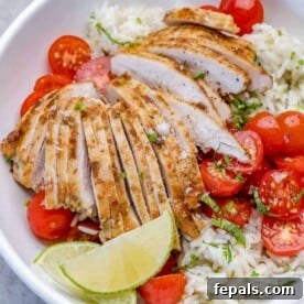 25 Chicken Meal Prep Recipes for Quick, Flavorful Weeknight Meals 6 one bowl of cilantro lime chicken with rice, limes, and tomatoes