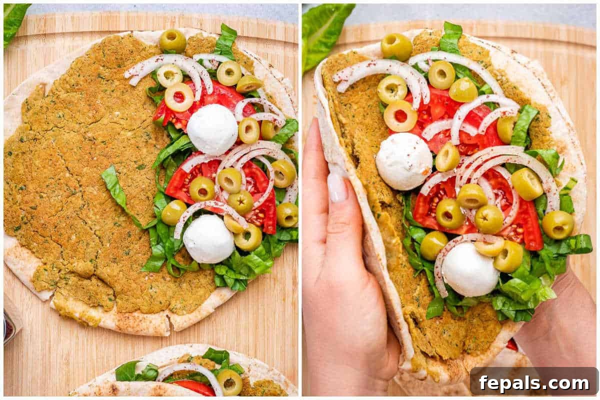 assembling the smash pita with the falafel garnishes.
