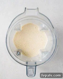 blended protein shake in a blender.
