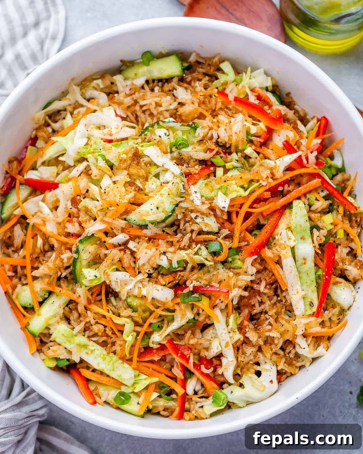 a large white bowl with crispy rice salad.