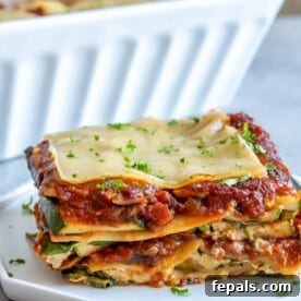 side view of lasagna piece on a plate