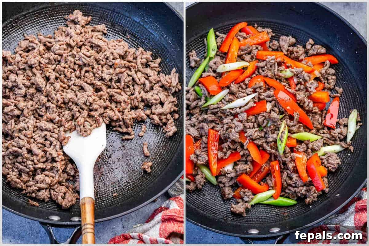 ground beef browned in a pan and then veggies added over the beef.