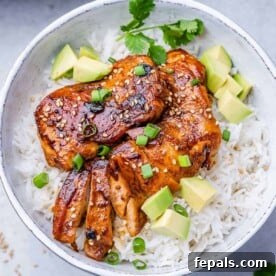 Weeknight Boneless Chicken Thigh Recipes 3 top view sliced korean chicken thighs over a plate of rice in a bowl