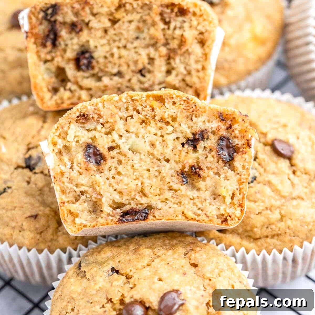 Baked muffin sliced in half to show the inside.