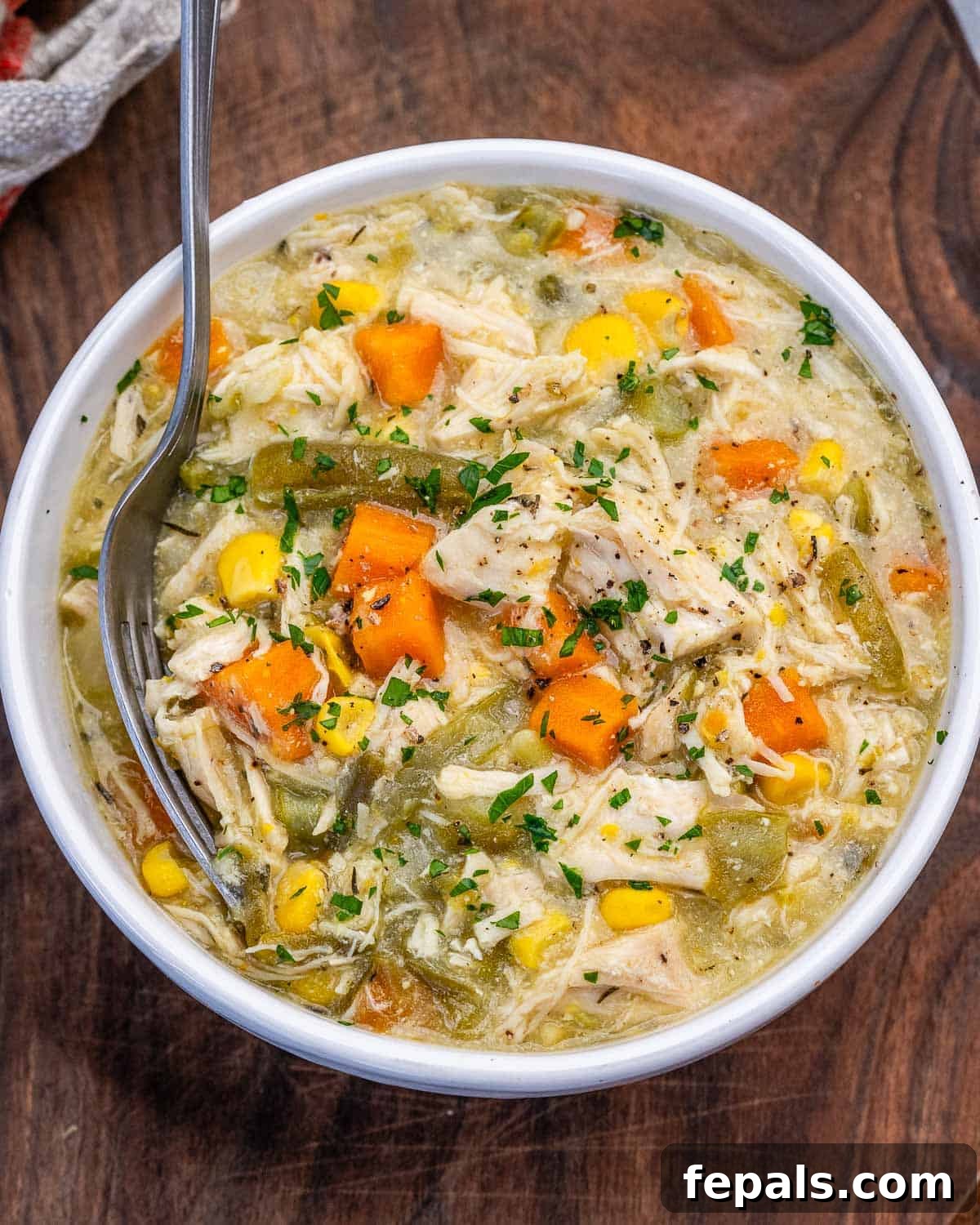 A white bowl of crockpot chicken pot pie.