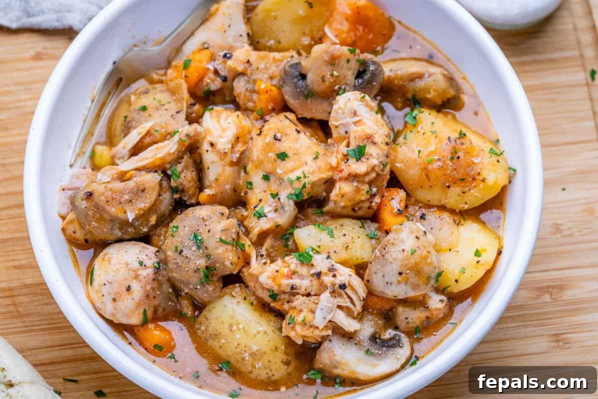 Chicken stew with veggies in a bowl.