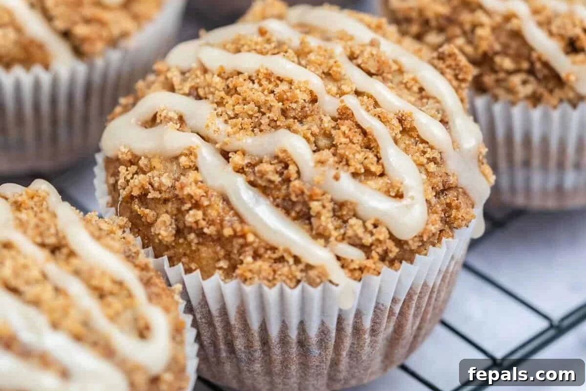 glazed coffee cake muffin on a flat surface.