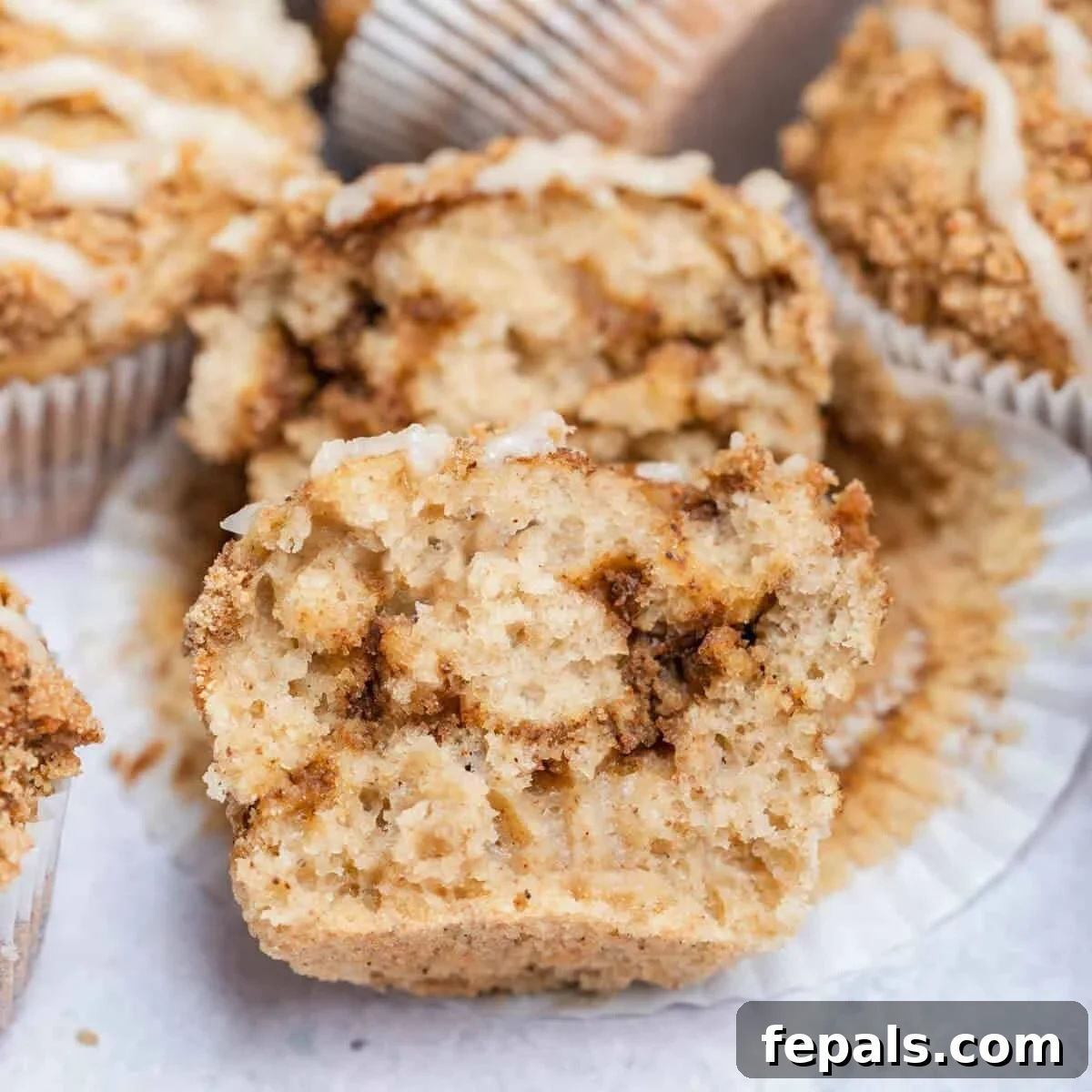 Cinnamon coffee muffins sliced in half.