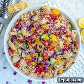 Vegetarian Pasta Recipes for Flavorful Weeknight Dinners 7 a bowl of pasta salad loaded with veggies and tossed in dressing.