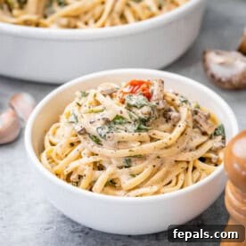 Vegetarian Pasta Recipes for Flavorful Weeknight Dinners 10 Creamy pasta in a round white bowl.
