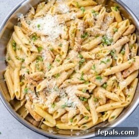 top view of chicken carbonara pasta in a silver pan