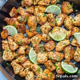 top view chicken bites in a black skillet
