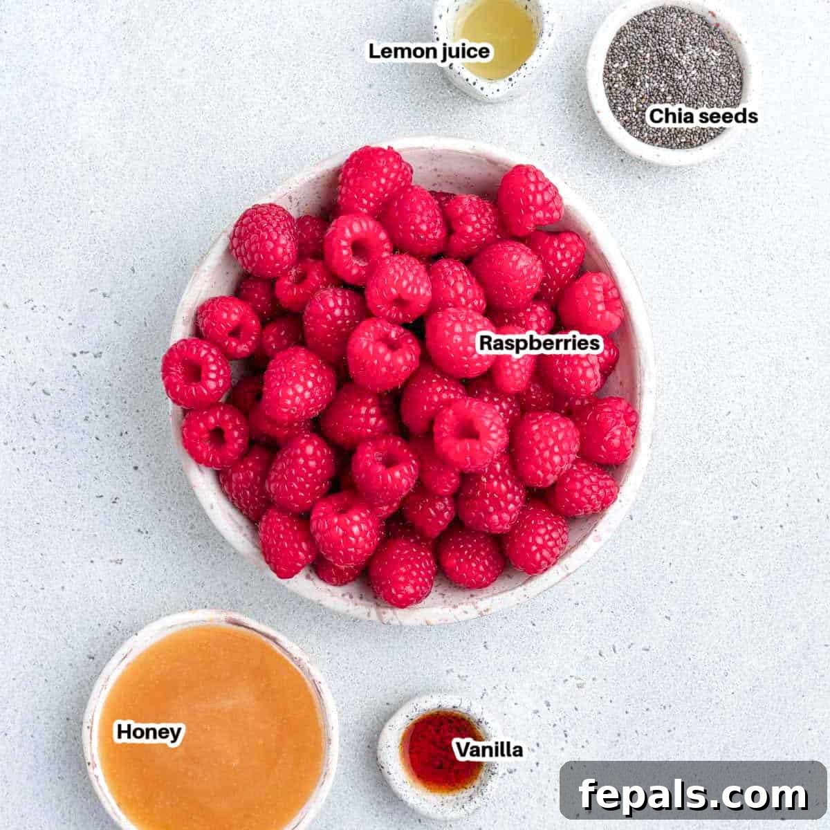 ingredients to make raspberry jam.